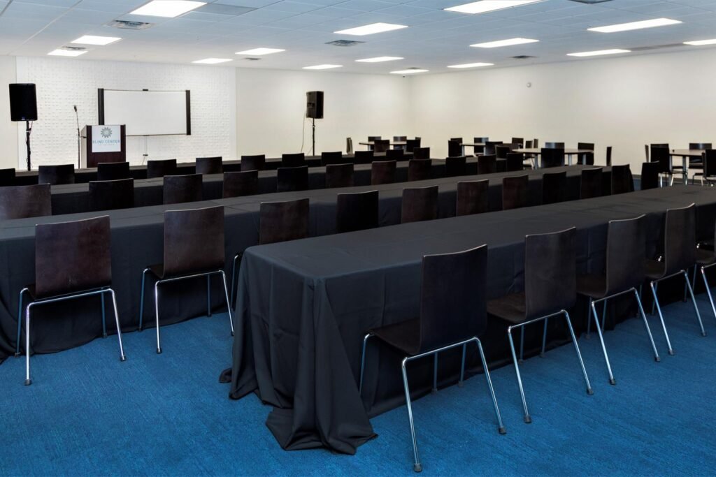 chairs and tables in classroom style