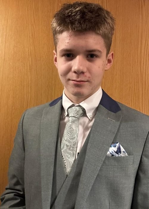 Teenage boy in a suit